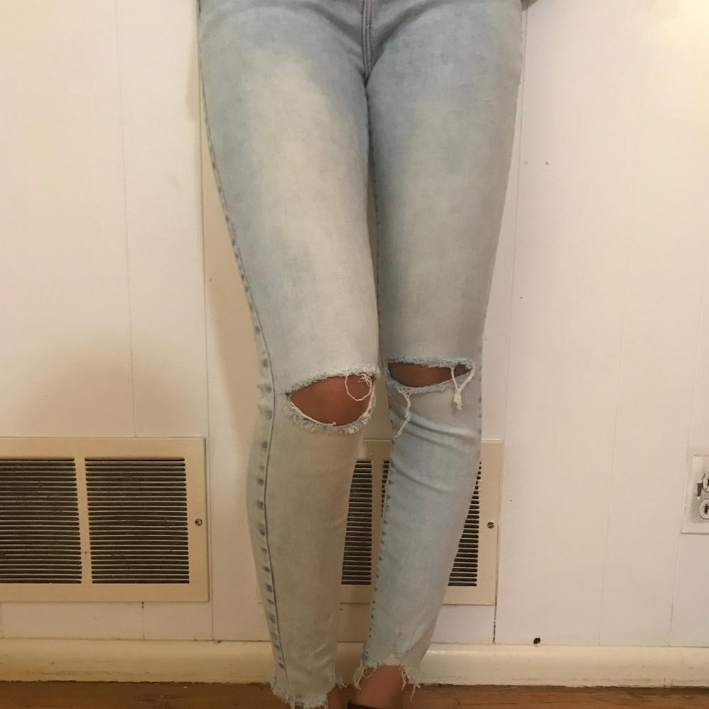 Distressed Light Blue Pull Up Jeans